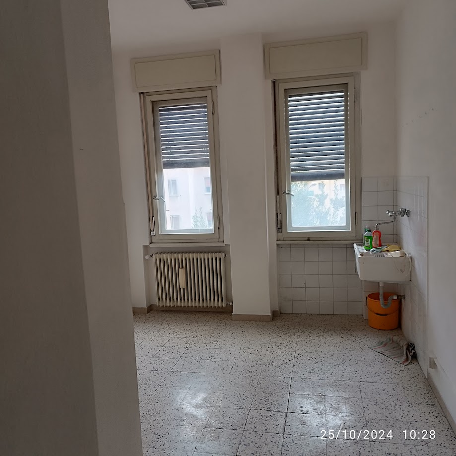 Cucina originaria prima della trasformazione in camera