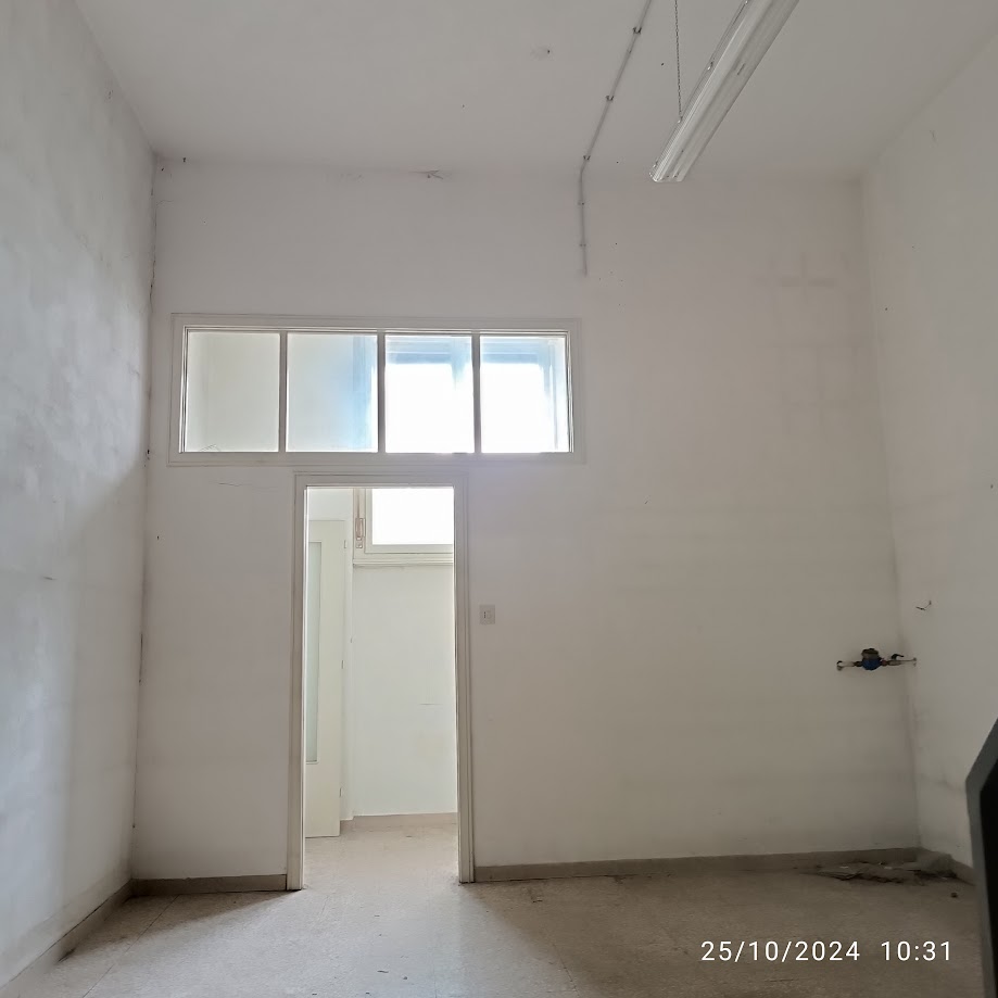 Magazzino prima della trasformazione in camera da letto